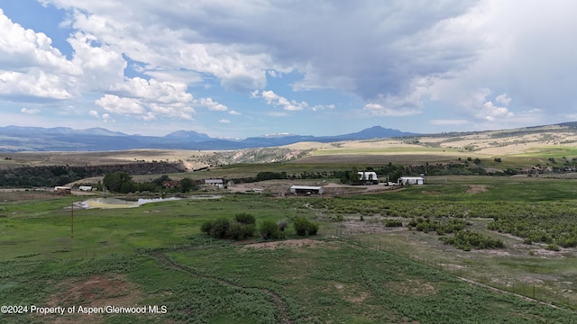 property view of mountains featuring a rural view