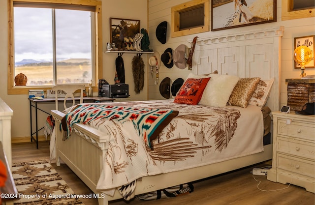 bedroom featuring hardwood / wood-style flooring