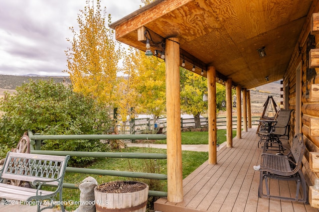 deck featuring covered porch