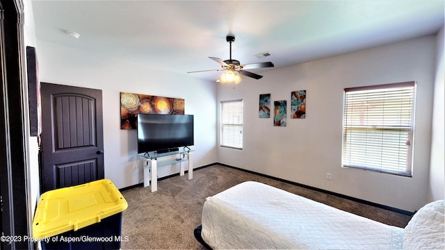 carpeted bedroom featuring ceiling fan