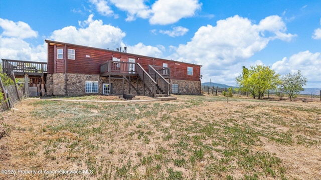 160 Mustang Mesa Trl, Rifle, CO 81650 - back of house with a deck, stairs, and stone siding