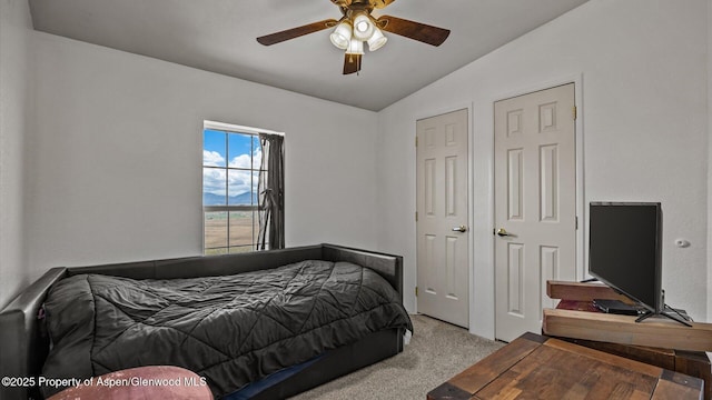 160 Mustang Mesa Trl, Rifle, CO 81650 - bedroom with lofted ceiling, carpet floors, and a ceiling fan