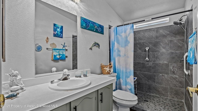 160 Mustang Mesa Trl, Rifle, CO 81650 - full bath with tiled shower, vanity, and a textured wall