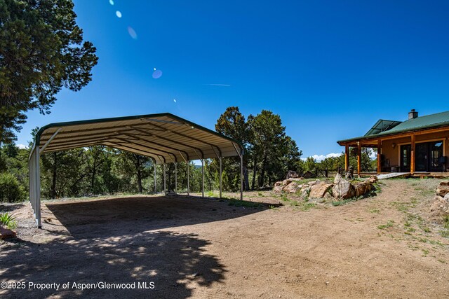 701/700 Bella Vista Ln, Cotopaxi, CO 81223 - surrounding community with a detached carport and driveway