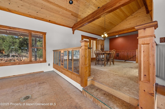 701/700 Bella Vista Ln, Cotopaxi, CO 81223 - unfurnished dining area featuring wooden ceiling with exposed beams, high vaulted ceiling, and a chandelier