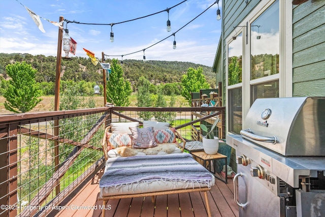 106 Lakeside Ct, Basalt, CO 81621 - wooden terrace featuring grilling area and a forest view