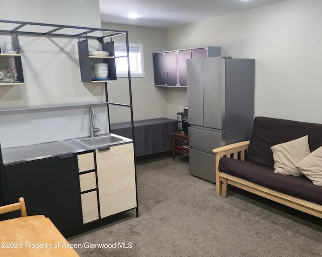 175 Midland Ave Unit 4, Basalt, CO 81621 - carpeted bedroom featuring freestanding refrigerator and a sink