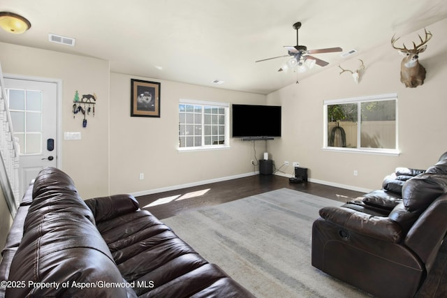 120 Harris Ln, Parachute, CO 81635 - living room featuring baseboards, visible vents, a ceiling fan, and a wealth of natural light