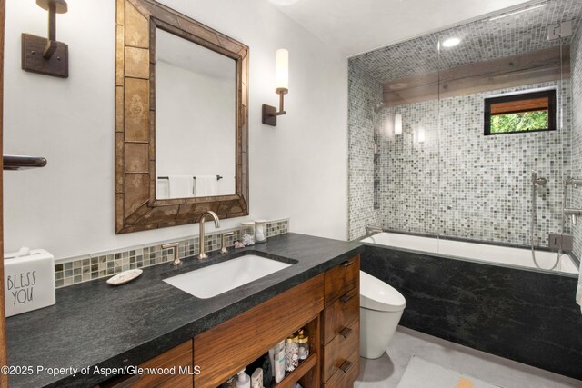 2701 County Rd 100, Carbondale, CO 81623 - bathroom featuring toilet, vanity, and shower / washtub combination