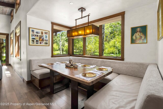 2701 County Rd 100, Carbondale, CO 81623 - dining space featuring wood finished floors and beamed ceiling