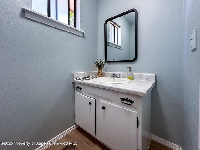 560 Willowwood Ln, Delta, CO 81416 - bathroom featuring vanity and baseboards