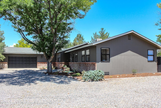 560 Willowwood Ln, Delta, CO 81416 - view of front facade with driveway and an attached garage
