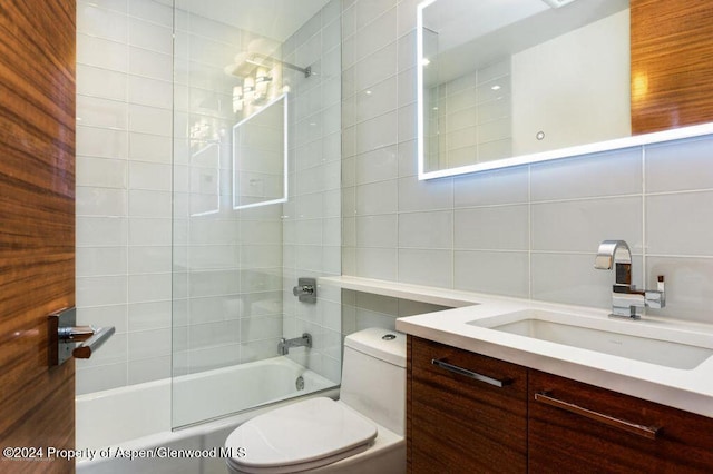 205 E Durant Ave Unit 2J, Aspen, CO 81611 - full bath featuring tile walls, vanity, toilet, bathing tub / shower combination, and backsplash