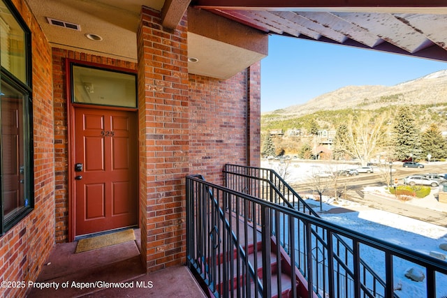 balcony featuring a mountain view