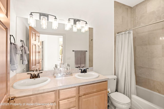 full bathroom featuring toilet, vanity, and shower / bath combo