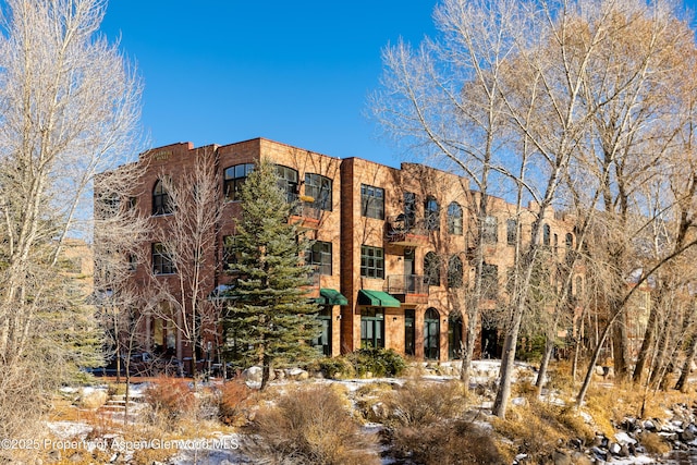 view of snow covered property