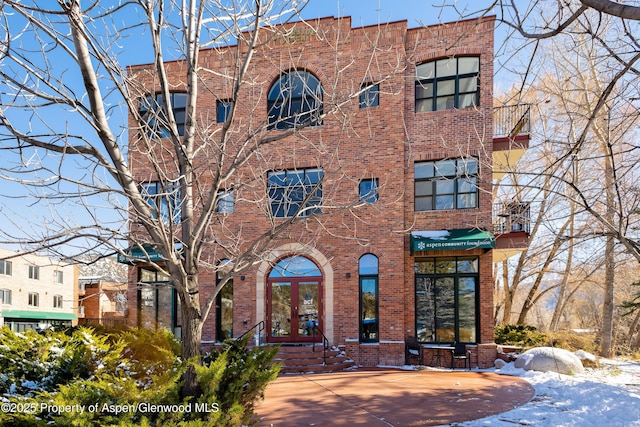 view of snow covered building