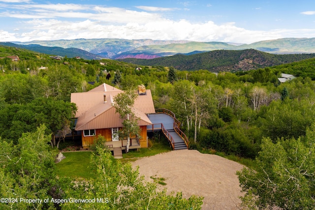 drone / aerial view featuring a mountain view