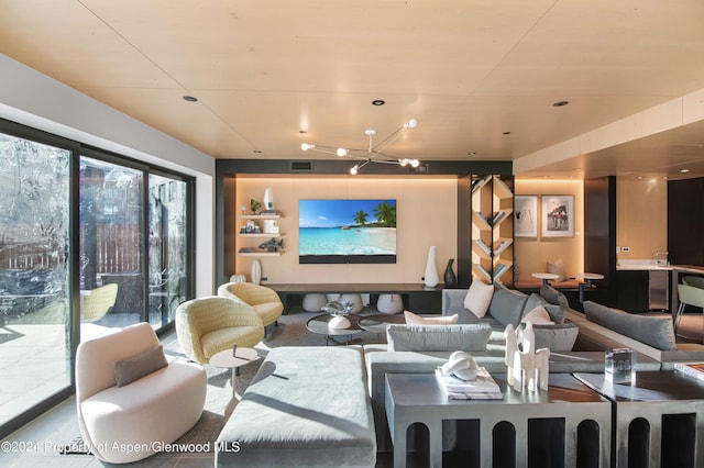 living room featuring a chandelier