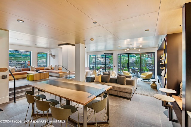 dining area featuring plenty of natural light and ceiling fan