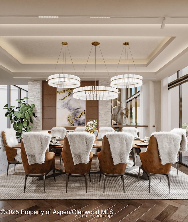 dining area featuring a raised ceiling