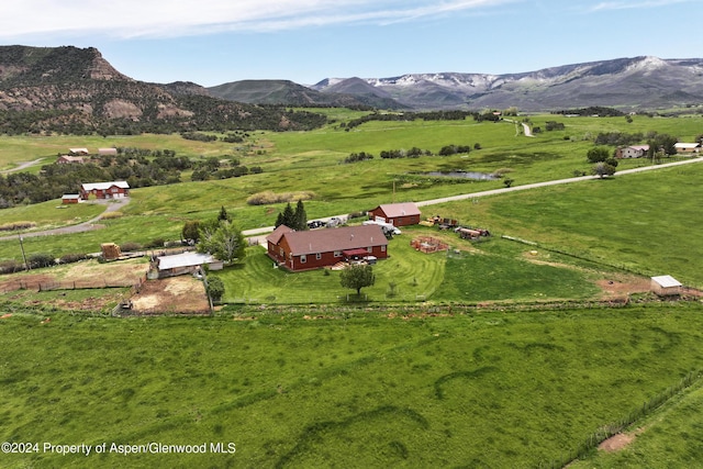 aerial view with a mountain view and a rural view