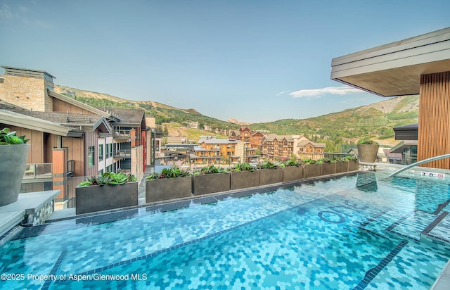 view of pool featuring a mountain view