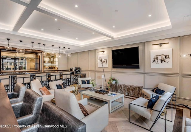 interior space featuring light parquet floors, a raised ceiling, and beam ceiling