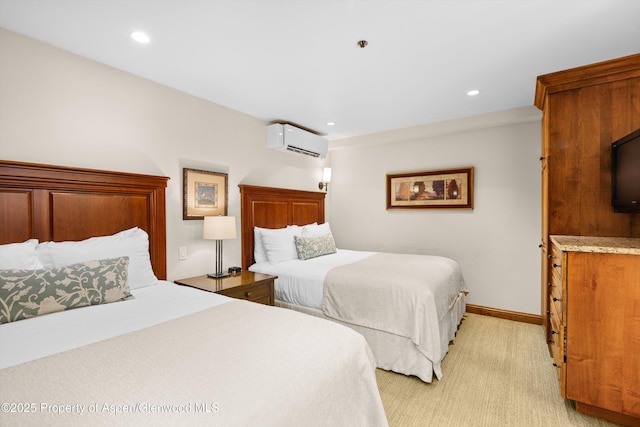610 S W End St Unit H202, Aspen, CO 81611 - bedroom with a wall mounted air conditioner, light colored carpet, and recessed lighting