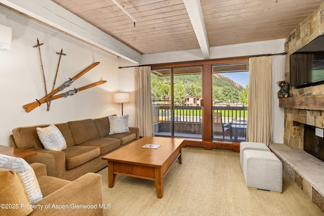 610 S W End St Unit H202, Aspen, CO 81611 - living room with a wooden ceiling with exposed beams, carpet flooring, and a fireplace