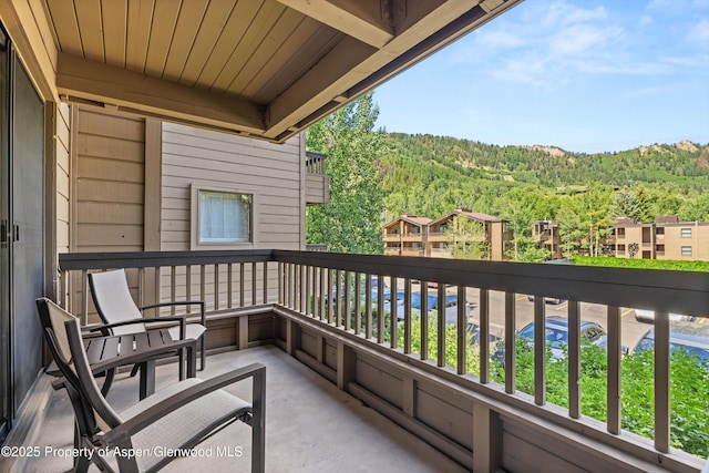 610 S W End St Unit H202, Aspen, CO 81611 - balcony featuring a wooded view