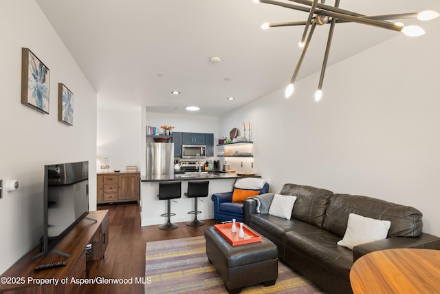 1400 E Valley Rd Unit 110, Basalt, CO 81621 - living room featuring dark wood-type flooring and recessed lighting