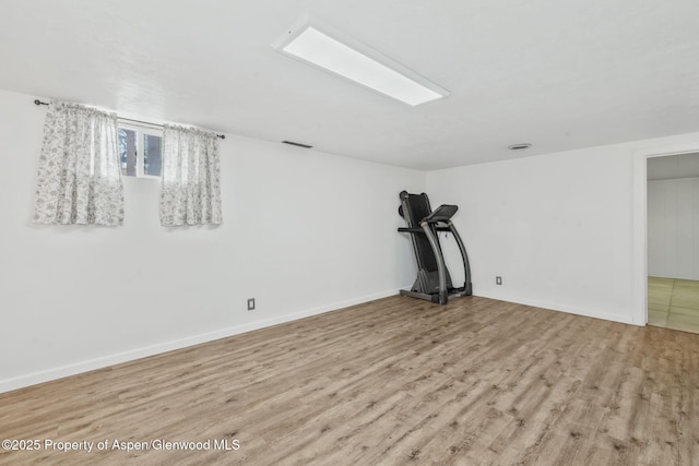 235 W 8th St, Craig, CO 81625 - exercise room with wood finished floors and baseboards