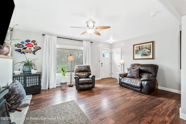 235 W 8th St, Craig, CO 81625 - living area featuring ceiling fan, hardwood / wood-style flooring, and baseboards