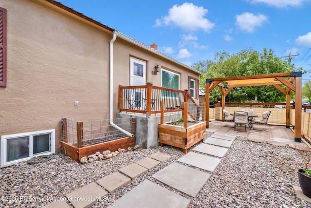 235 W 8th St, Craig, CO 81625 - view of patio featuring fence