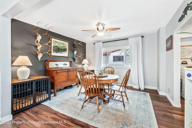 235 W 8th St, Craig, CO 81625 - dining space with a ceiling fan, wood finished floors, and baseboards