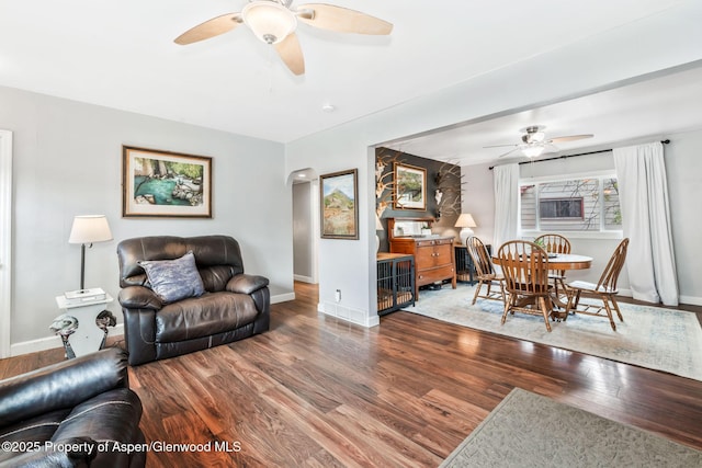 235 W 8th St, Craig, CO 81625 - living room featuring ceiling fan, wood finished floors, and baseboards