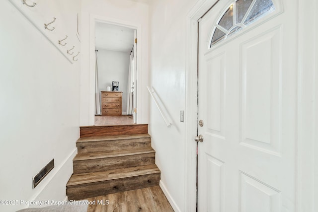 235 W 8th St, Craig, CO 81625 - stairway with wood finished floors