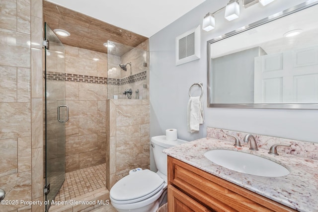 235 W 8th St, Craig, CO 81625 - full bathroom featuring a shower stall, toilet, and vanity