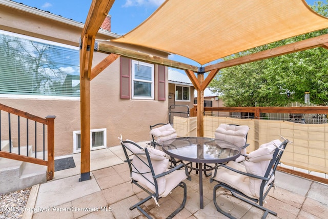 235 W 8th St, Craig, CO 81625 - view of patio / terrace with fence, outdoor dining area, and a gazebo