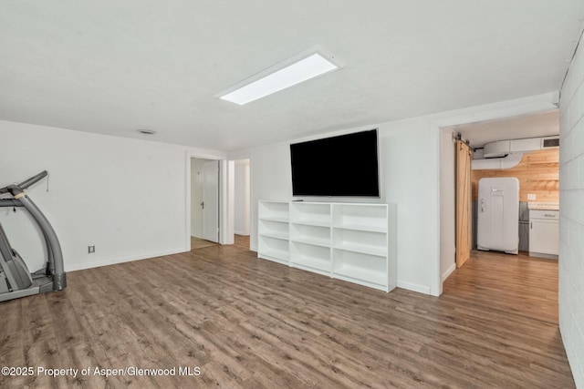 235 W 8th St, Craig, CO 81625 - exercise area featuring wood finished floors and baseboards