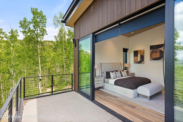 1234 Wood Rd, Snowmass Village, CO 81615 - bedroom with a towering ceiling and a view of trees