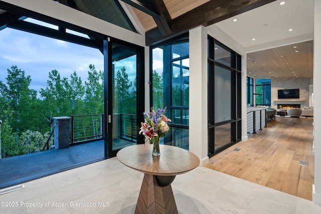 1234 Wood Rd, Snowmass Village, CO 81615 - interior space with a large fireplace
