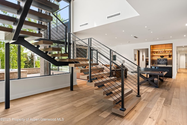 1234 Wood Rd, Snowmass Village, CO 81615 - stairway featuring wood finished floors, recessed lighting, and baseboards