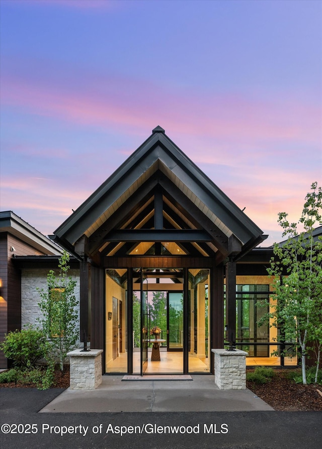 1234 Wood Rd, Snowmass Village, CO 81615 - doorway to property with stone siding