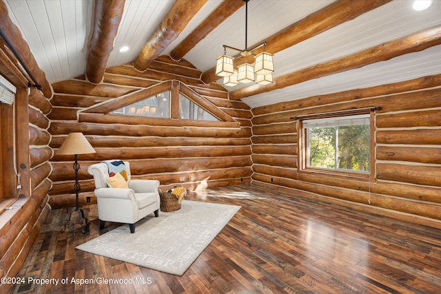 unfurnished room featuring lofted ceiling with beams, dark hardwood / wood-style floors, and log walls