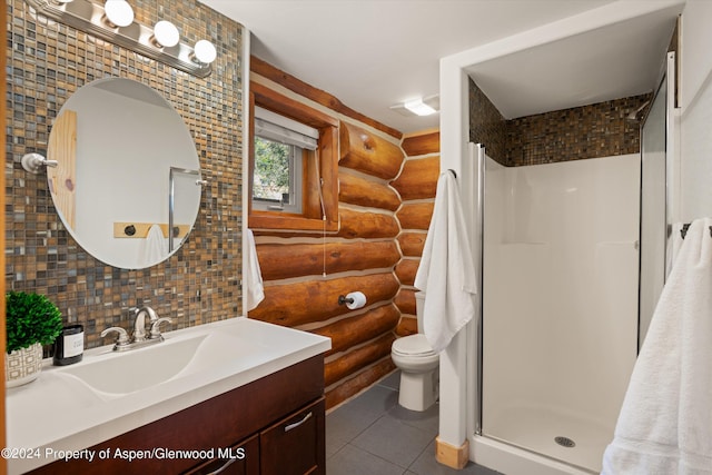 bathroom with decorative backsplash, rustic walls, walk in shower, vanity, and toilet