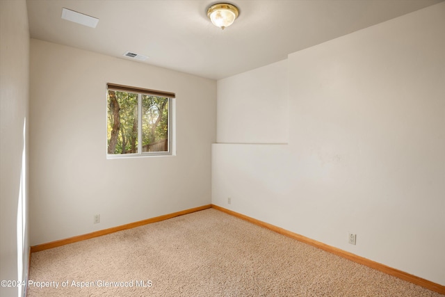 view of carpeted spare room