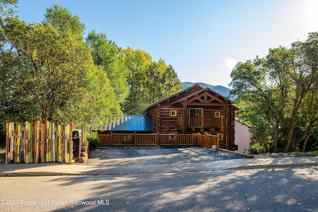 view of front of house featuring a mountain view