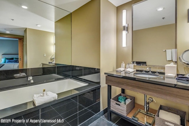 130 Wood Rd Unit 625, Snowmass Village, CO 81615 - ensuite bathroom featuring tile patterned floors, vanity, and recessed lighting